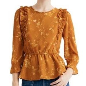 Feminine Ruffle-Shoulder Peplum Top in Tonal Botanical